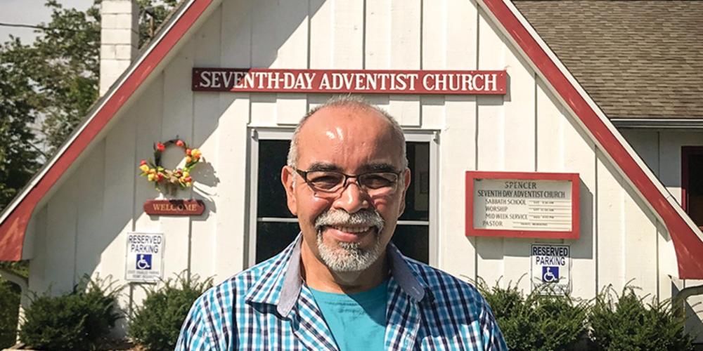 John Peña, 57, standing outside the Seventh-day Adventist church in Spencer, West Virginia. The church is among 35 that received Thirteenth Sabbath funds to organize evangelistic meetings in 2015. (Andrew McChesney / Adventist Mission)