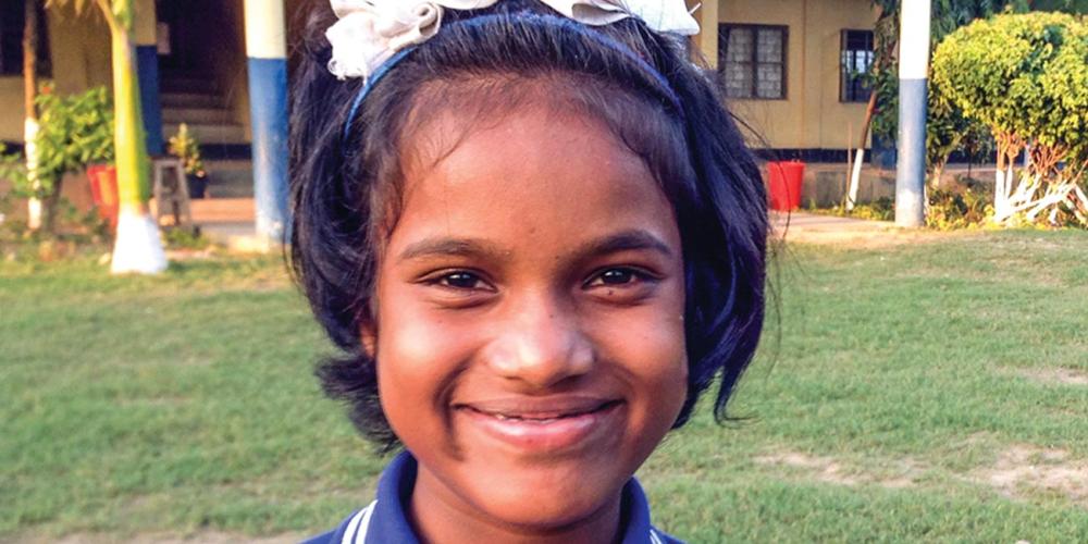 Niharika Karmakar, 11, has lived for the past three years with the Bible teacher at Nagaland Adventist School in Dimapur, the largest city in Nagaland state. (Andrew McChesney / Adventist Mission)
