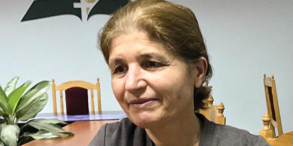 Nadezhda Raya, 54, says, “I found the priest and told him, ‘I have come to buy a Bible. I have an Adventist Bible, and I want to compare it with the Orthodox Bible.’” (Andrew McChesney / Adventist Mission)