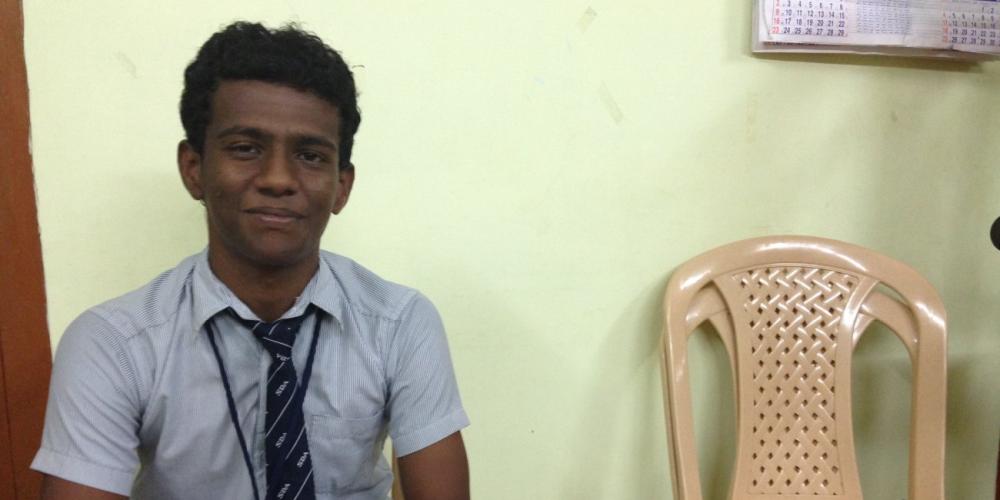Muthal Raj, 18, says, “God answered my prayers, and my father recovered from his injuries.” (Andrew McChesney / Adventist Mission)
