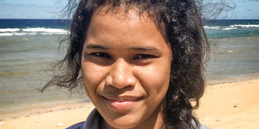 Flora Laik, 17, says, “When I just think about hitting someone, I feel awful. Jesus has changed my heart, and I am grateful to Him!” (Andrew McChesney / Adventist Mission)