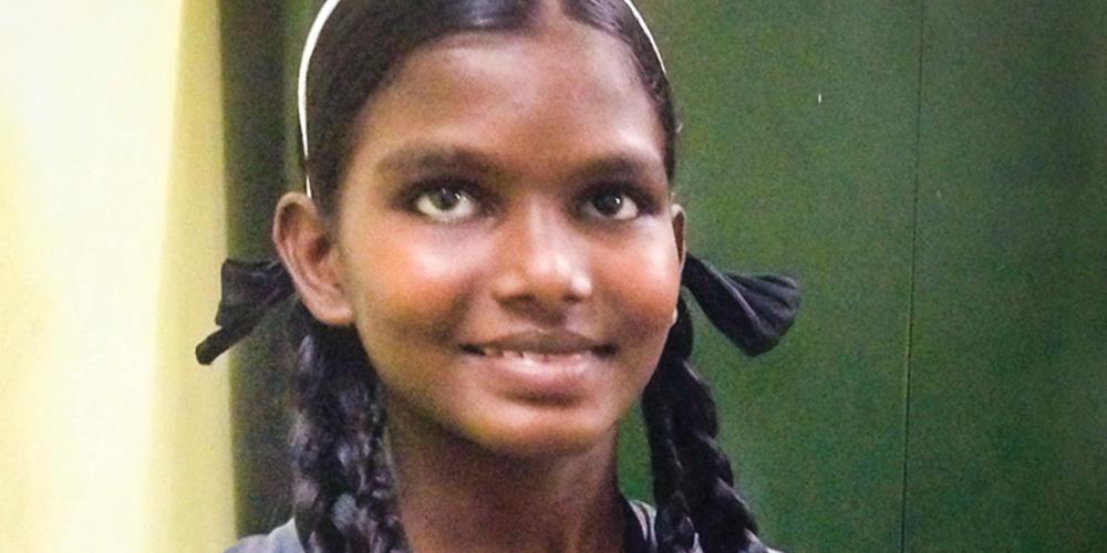 Vaishali Papa, 15, says, “I pray every day that my father will never drink again.” (Andrew McChesney / Adventist Mission)
